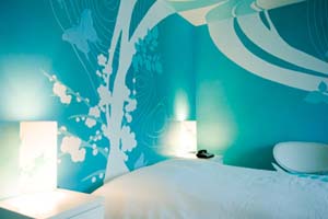 Small double with queen bed, and private facilities (shower)